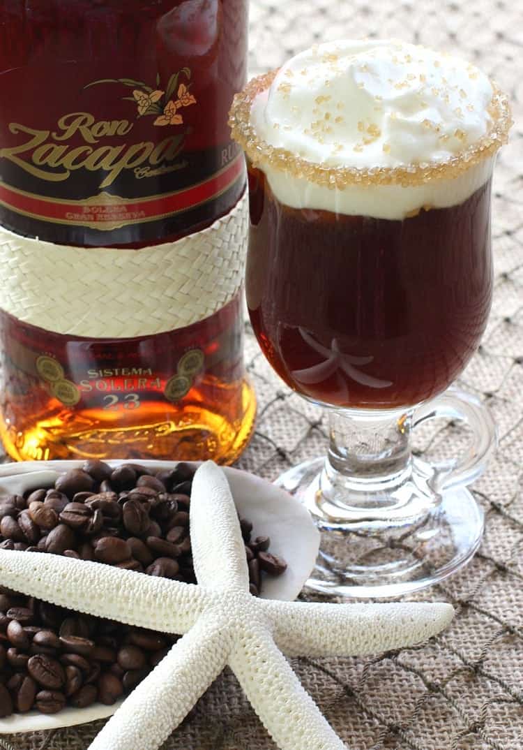 This Banana Rum Coffee is my kind of coffee. Perfect for brunch or an after dinner drink, strong and sweet with a hint of banana flavor! Island Coffee Drink with bottle