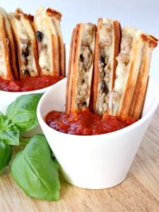 pizza sticks in cups with marinara sauce