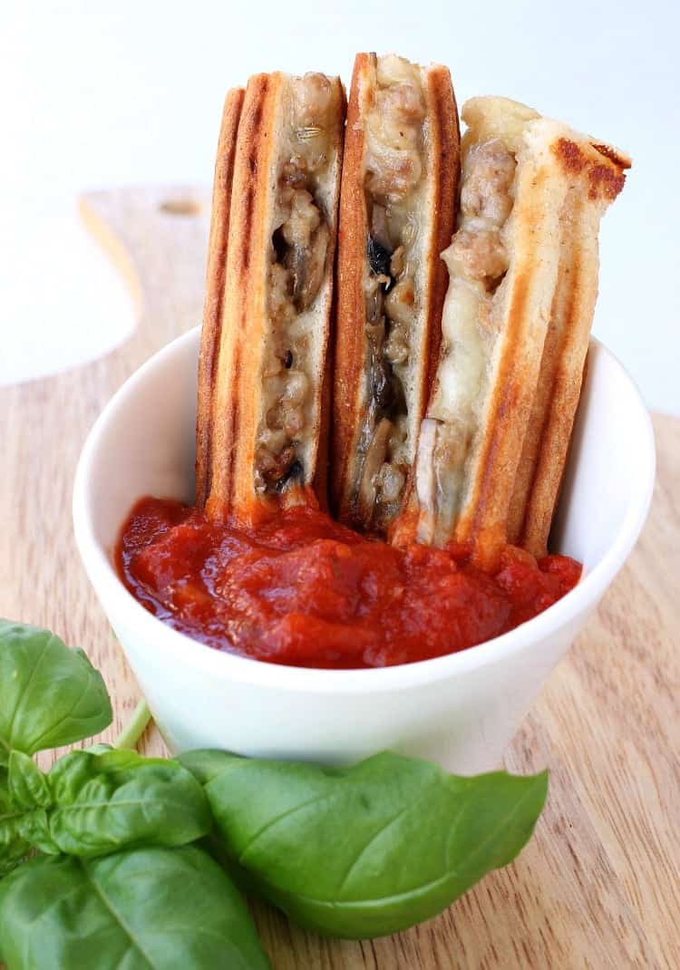 Panini Pizza Sticks are a fun twist on pizza night! Add your favorite pizza toppings or have a pizza toppings bar to customize your own! panini-pizza-sticks-top
