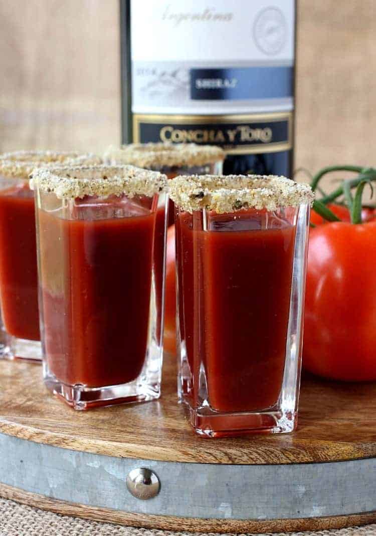 These Winey Mary Shooters are a fun twist on a Bloody Mary! A Bloody Mary shot made with red wine that's perfect for game days and brunch! shooters made with wine and bloody Mary mix