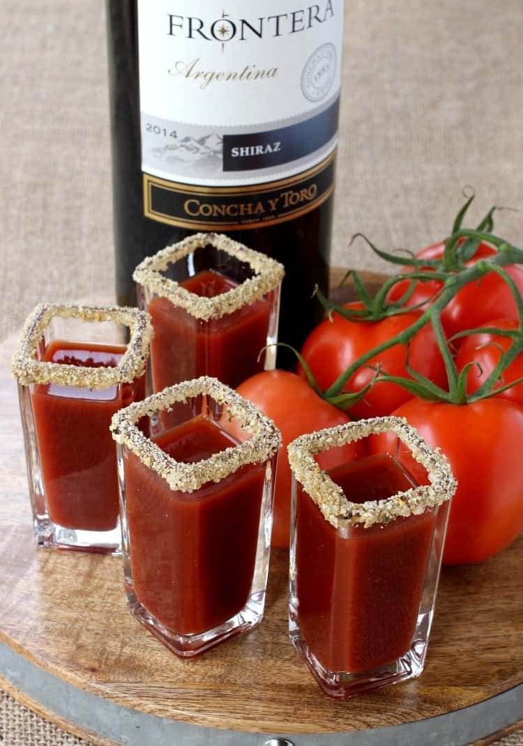 These Winey Mary Shooters are a fun twist on a Bloody Mary! A Bloody Mary shot made with red wine that's perfect for game days and brunch! winey-mary-shooters-top