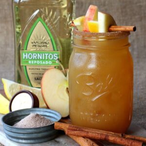 apple cider margarita in mason jar glass