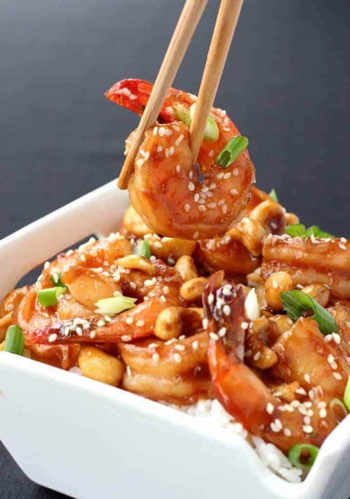 Stir Fry Shrimp and Cashews with green onions and sesame seeds in a bowl