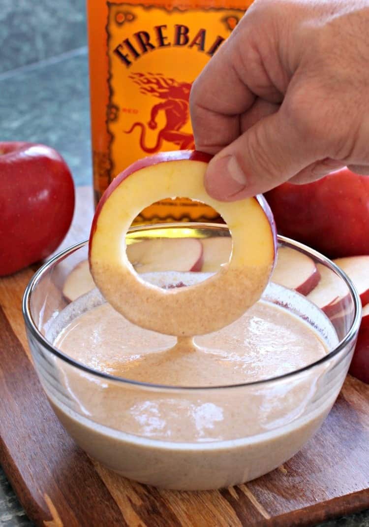 Fireball Apple Fritters are the ultimate party dessert! Fresh apple fritters coated in a cinnamon whiskey batter tossed with cinnamon sugar. fireball-apple-fritters-dip