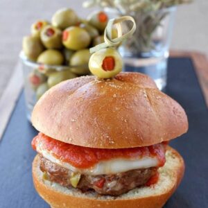 sausage sliders with olives with olive toothpicks