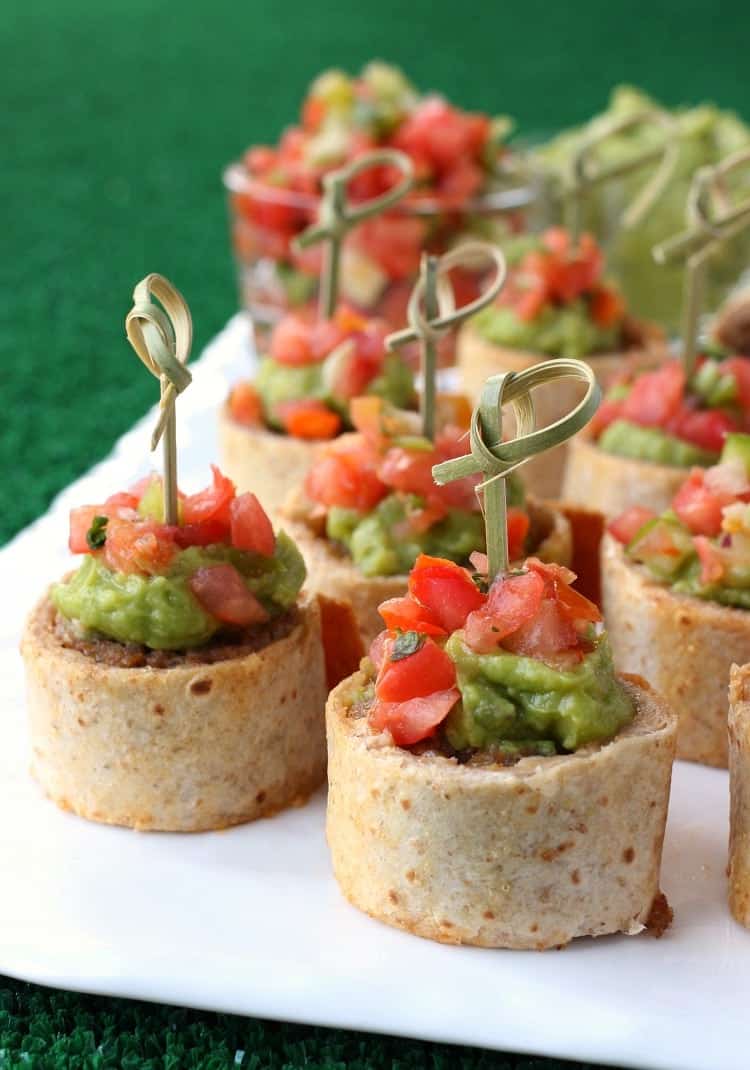 Tex-Mex Sausage Tortilla Rolls will be gone in seconds at your next party! A cheesy sausage roll filling wrapped in a crispy tortilla shell! tex-mex-sausage-tortilla-rolls
