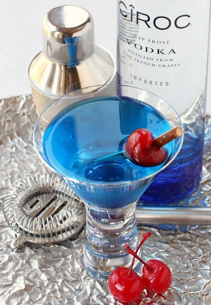 A Blue Heaven Martini is a vodka martini with a bright blue color from blue curaçao