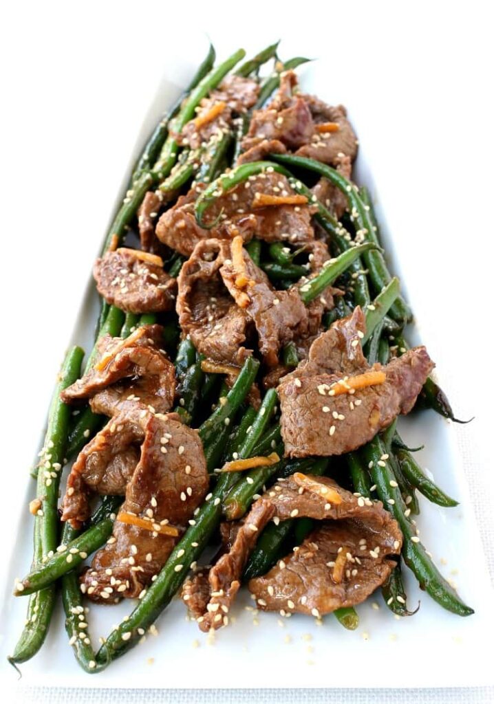 Ginger Beef and Green Bean Stir Fry on a white plate