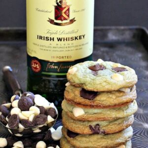 Chocolate chip cookies stacked on a tray