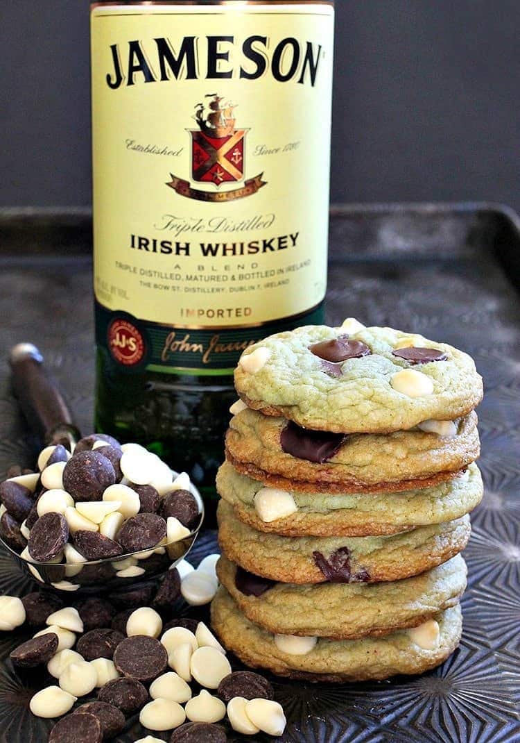 Chocolate chip cookies stacked on a tray