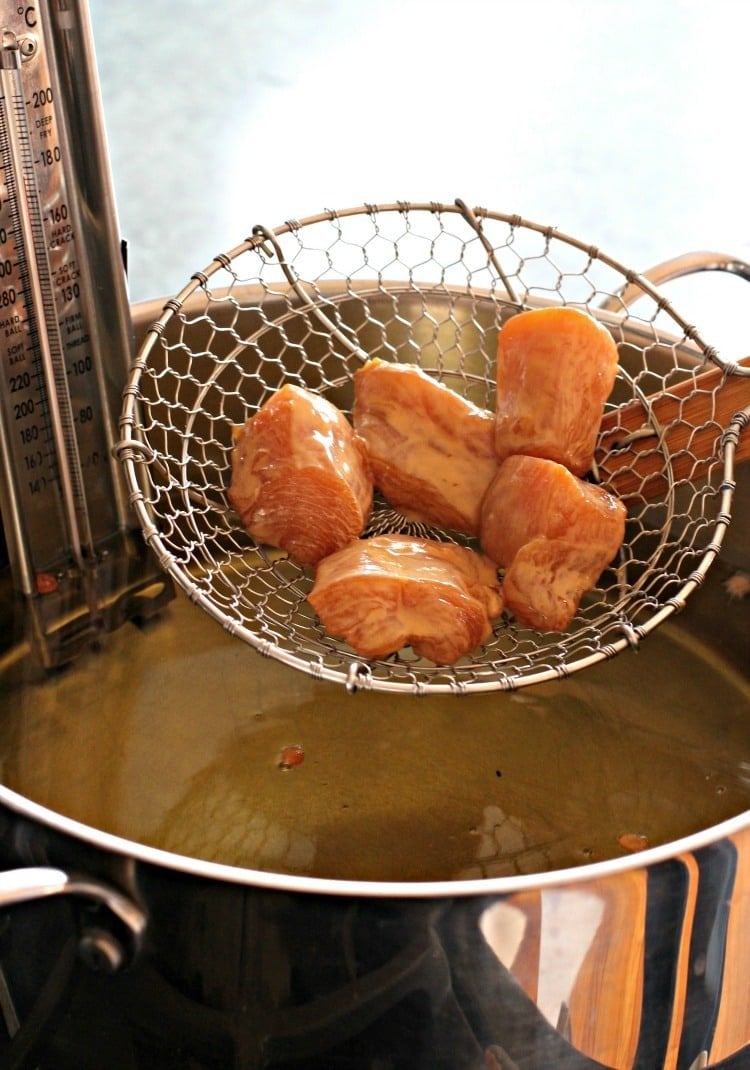 frying pieces of orange chicken