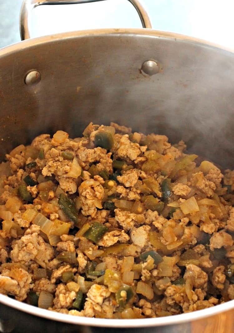 Thai Chicken Chili is a twist on our favorite peanut chicken recipe. A ground chicken chili with Thai inspired flavors and a mild heat! thai-chicken-chili-peppers-chicken