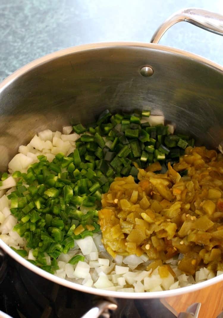 Thai Chicken Chili is a twist on our favorite peanut chicken recipe. A ground chicken chili with Thai inspired flavors and a mild heat! thai-chicken-chili-peppers