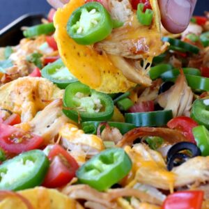 chicken sheet pan nachos on a tray