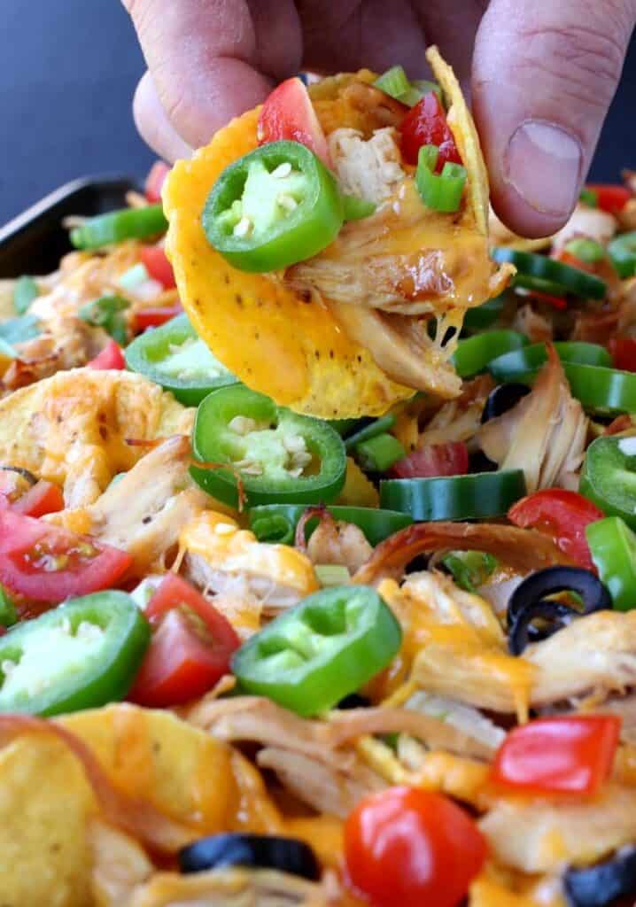 chicken sheet pan nachos on a tray