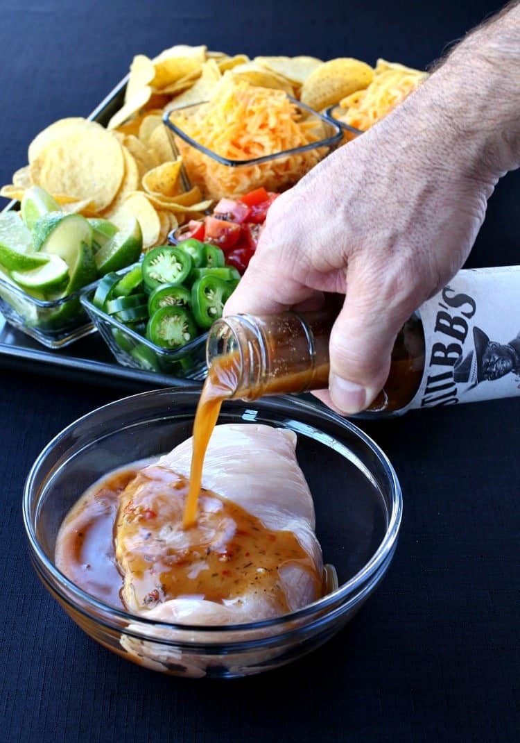 chicken nacho recipe starts with marinated chicken breasts