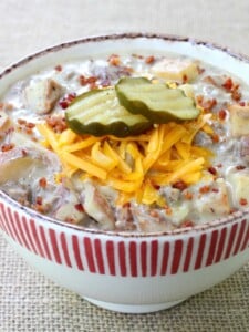 Cheeseburger & Fries Chowder in a striped bowl