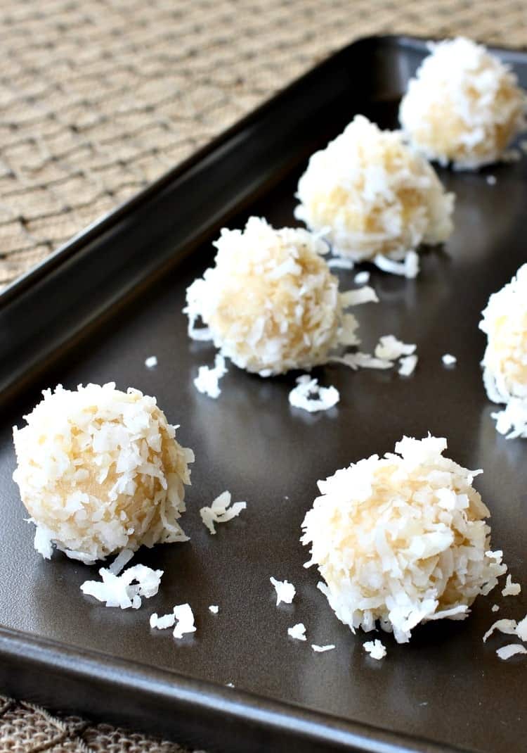 Coconut Rum Cookies are an easy cookie recipe that are rolled in coconut