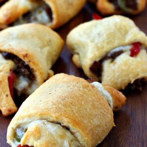 Philly Cheesesteak Crescent Rolls on a wood board