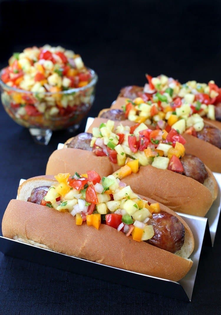 Bratwurst with Pineapple Tequila Salsa is a grilled bratwurst recipe topped with salsa