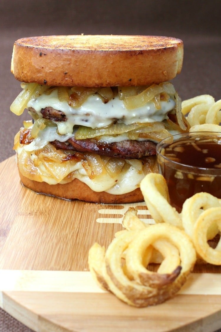cheeseburger with caramelized onions and fries
