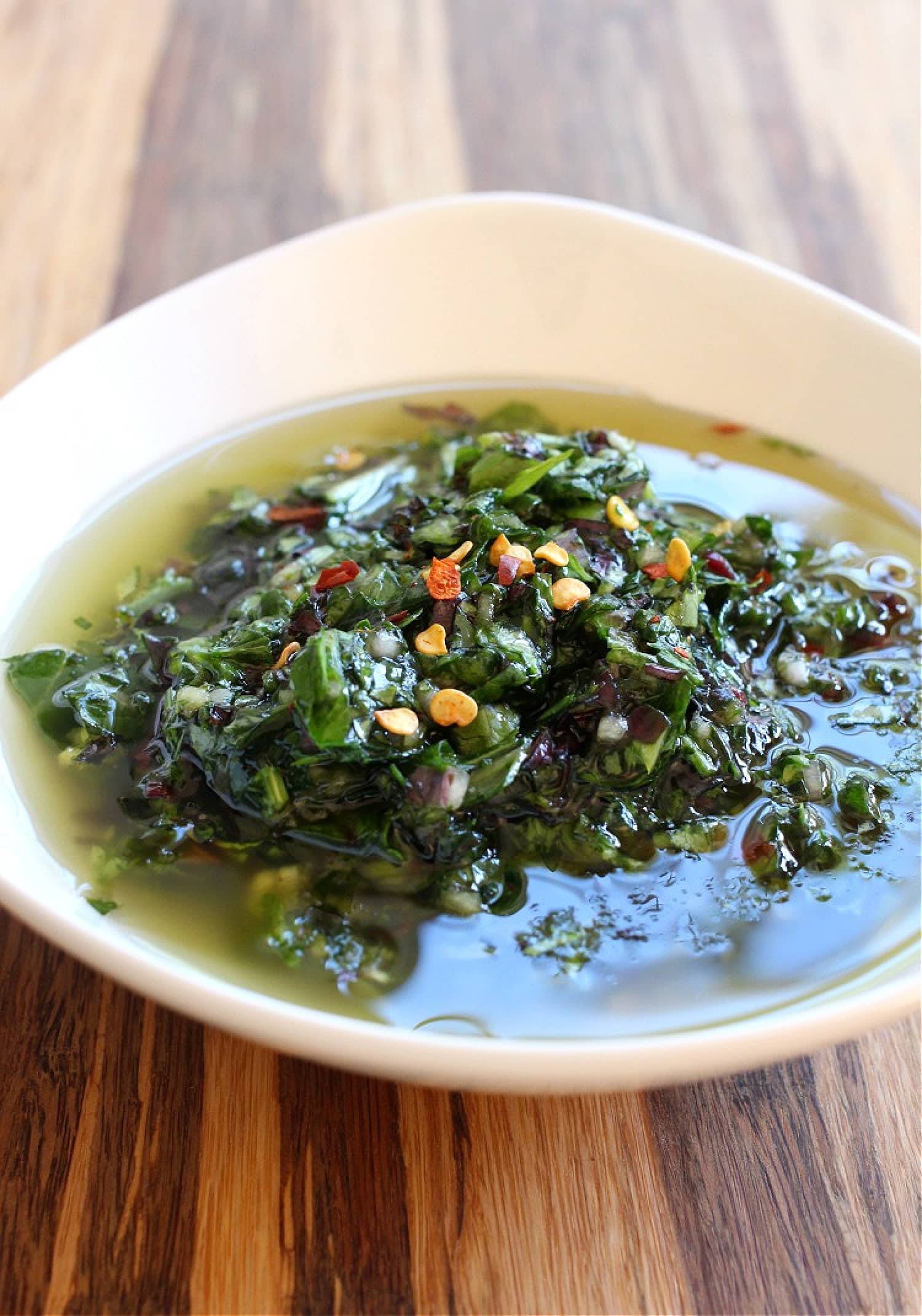 chimichurri sauce in white bowl