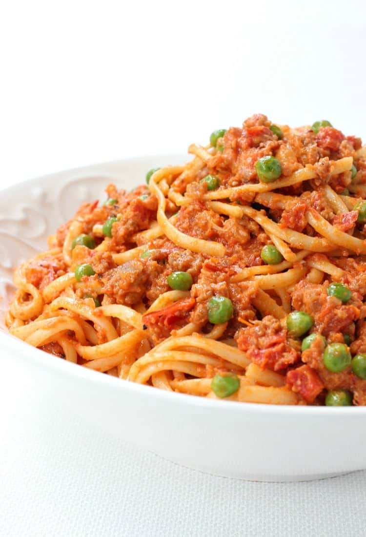 Creamy Sausage Spaghetti is loaded with sausage in a creamy tomato sauce!