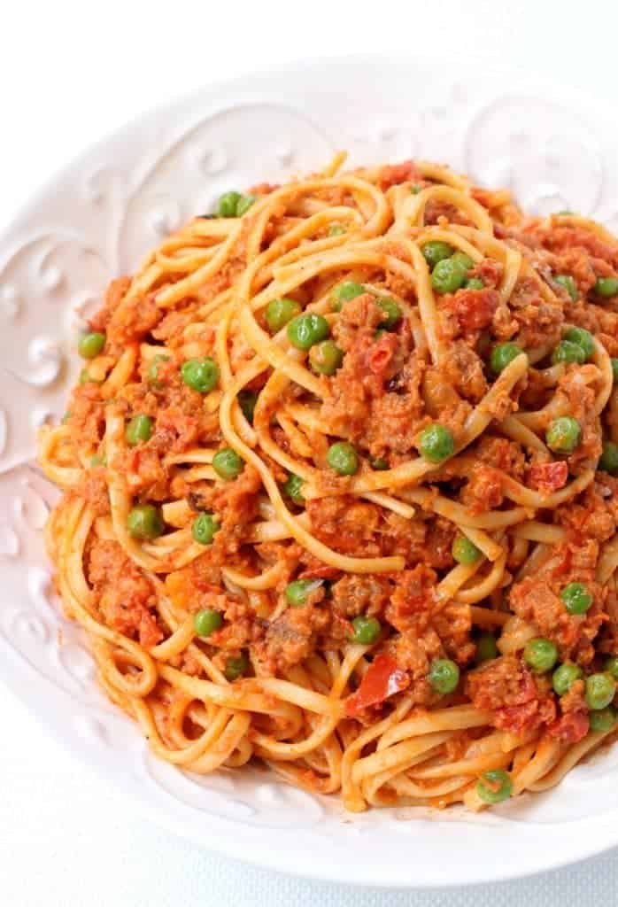 Creamy Sausage Spaghetti with sausage and peas is going to become your new favorite dinner!