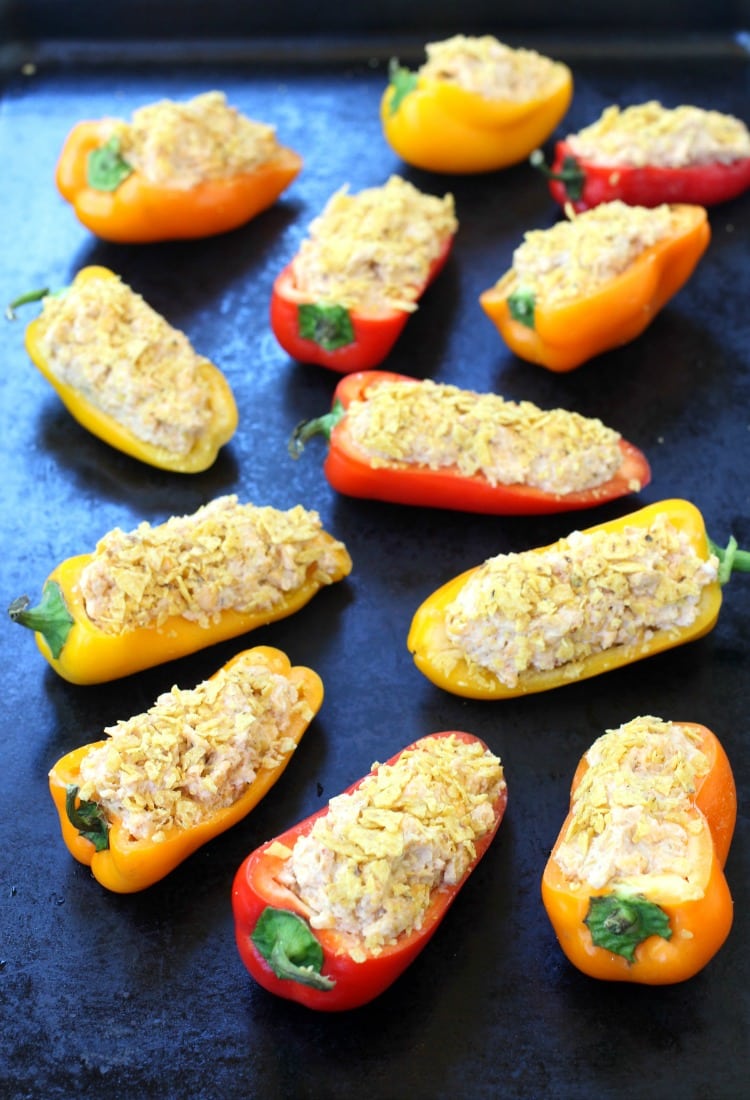 These Taco Pepper Poppers bake in the oven for just a few minutes to melt all that cheesy filling!