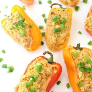 Taco Pepper Poppers appetizers are stuffed with a creamy, cheesy filling topped with crunchy tortilla chips!