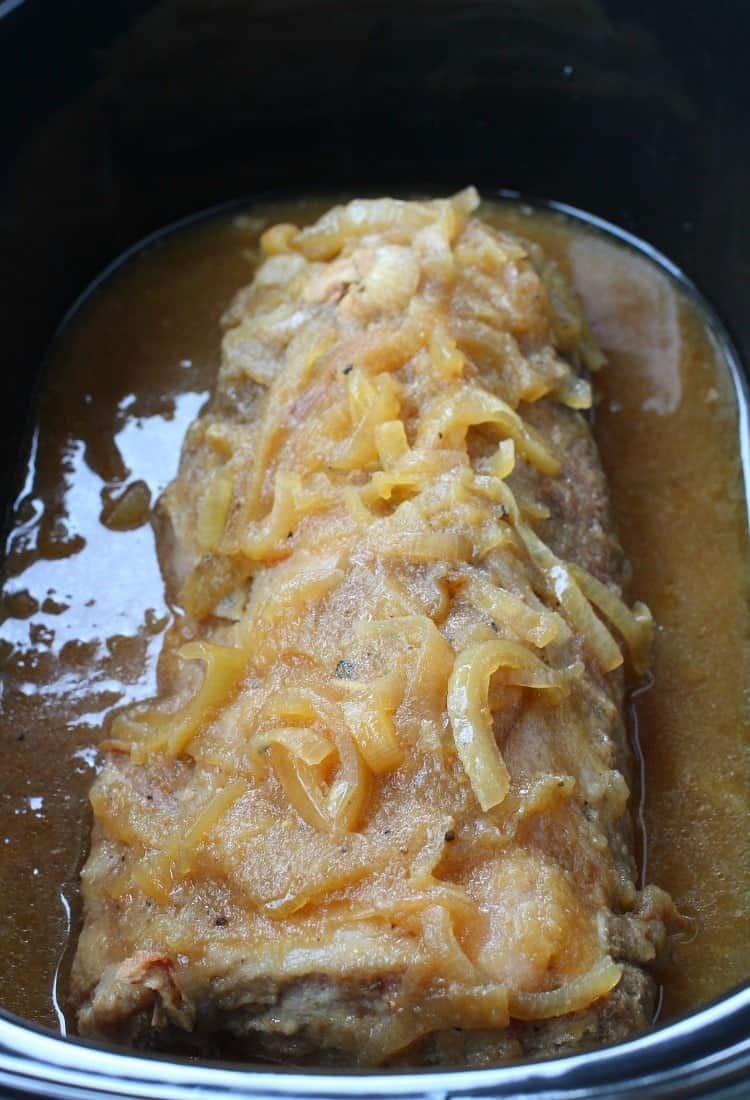 This Crock Pot Applesauce Pork Roast cooks all day but is still a sliceable roast