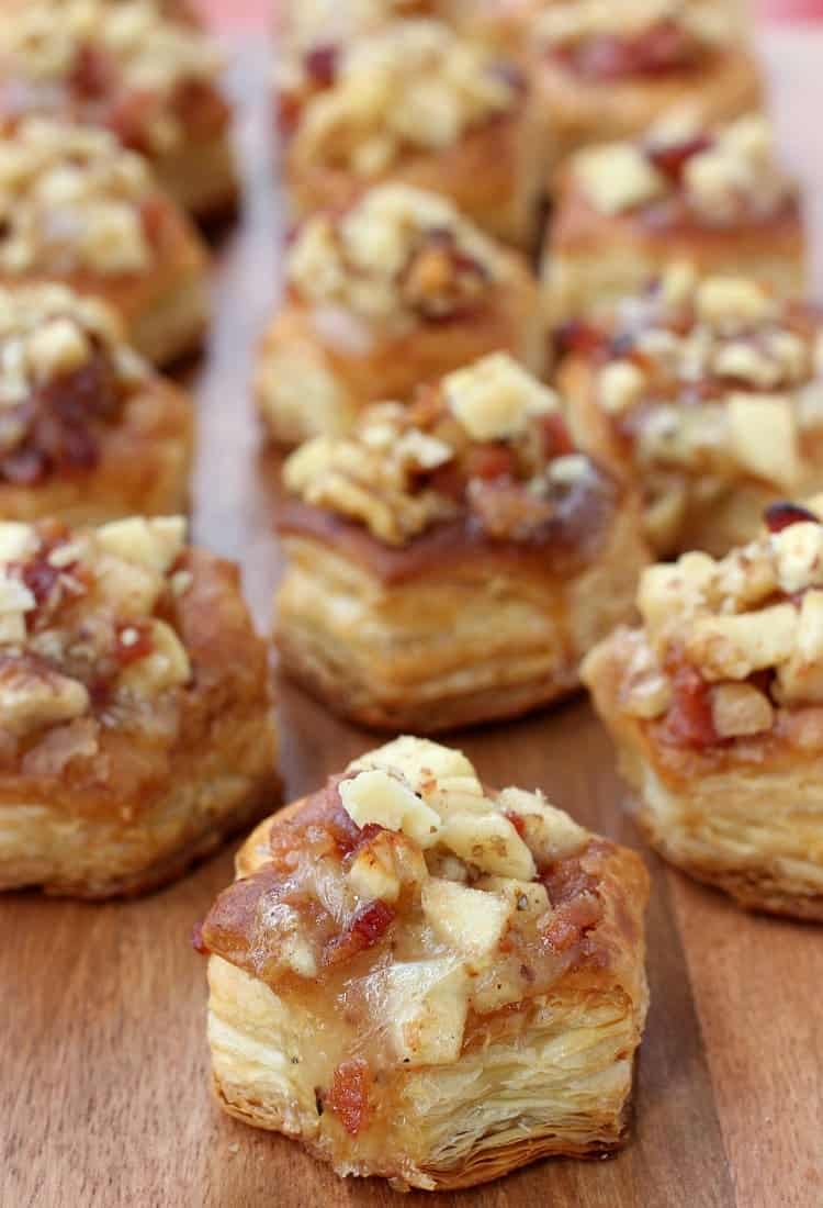 These Apple and Brie Phyllo Cups are an easy, one bite appetizer that everyone is sure to love. Get these ready for your Holiday parties! Apple Bacon and Brie Phyllo Cups are sweetened up with a drizzle of honey!