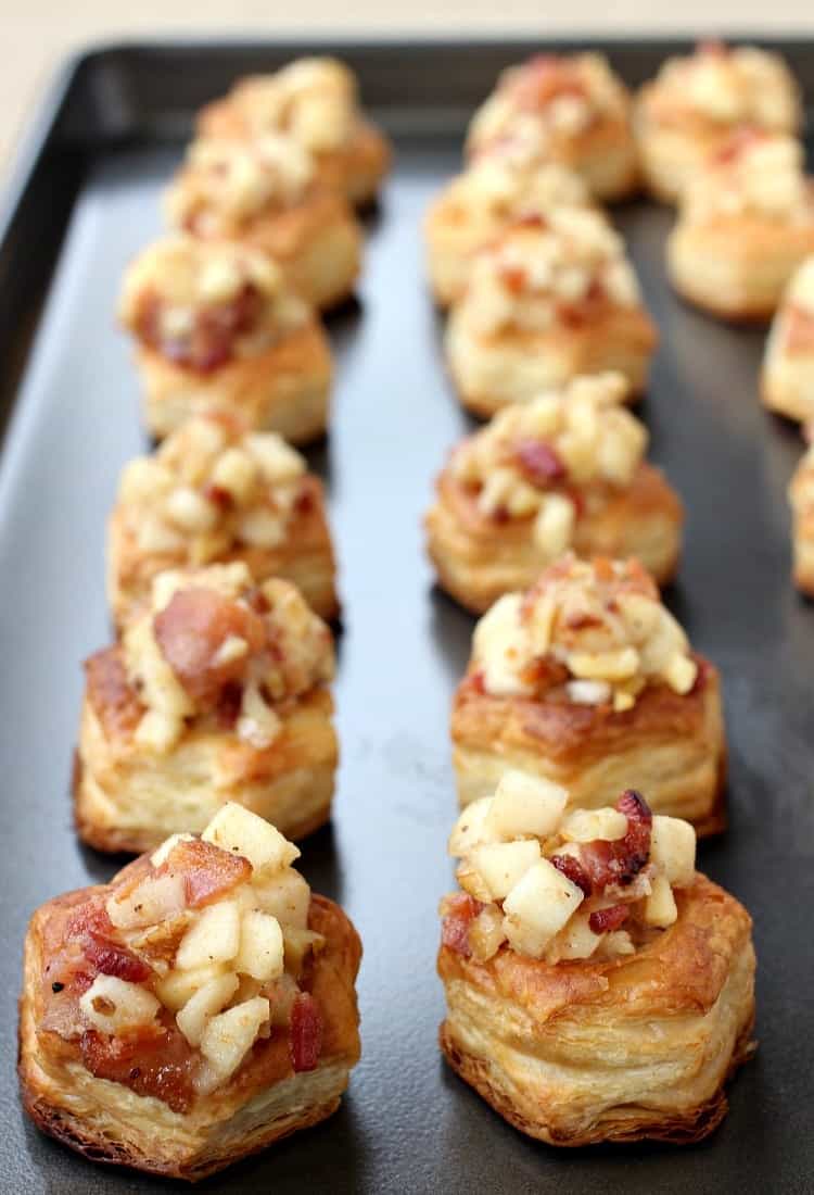 These Apple and Brie Phyllo Cups are an easy, one bite appetizer that everyone is sure to love. Get these ready for your Holiday parties! Apple Bacon and Brie Phyllo Cups bake up in just minutes!