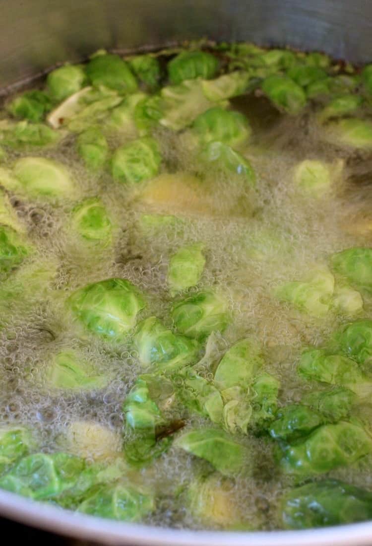 Fried Whiskey Glazed Brussels Sprouts fry for a few minutes, then tossed in that awesome glaze!