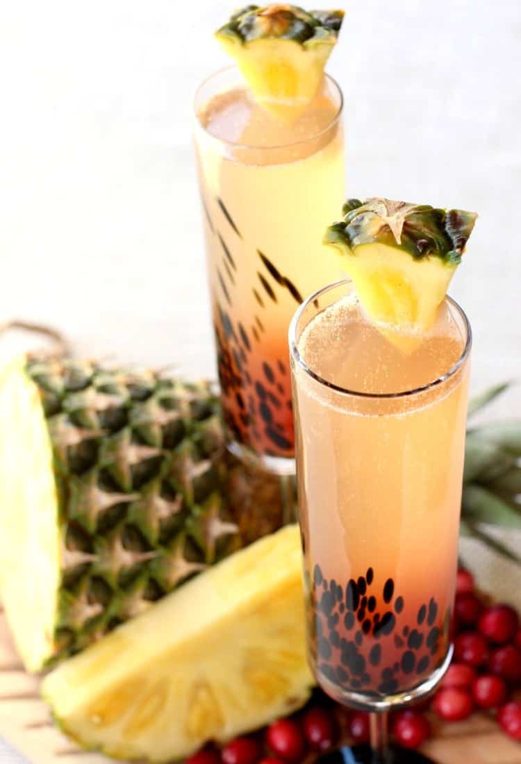 Island Champagne Cocktail is a champagne drink that has tropical flavors