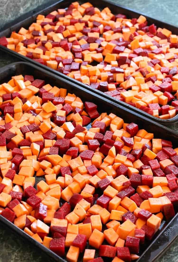 Roasted Beets and Sweets with Brown Butter Maple Glaze roast in the oven with olive oil, salt and pepper.