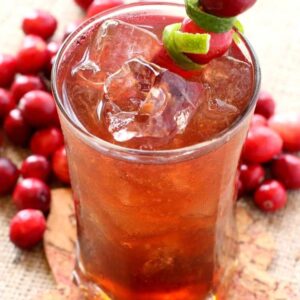 This Rum Harvest Cocktail is flavored with fresh lime and cranberry juice!