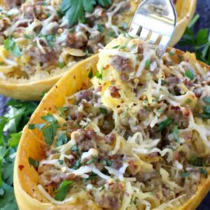 Sausage SPaghetti Squash with Apple Cider Glaze is loaded with sausage and cheese!