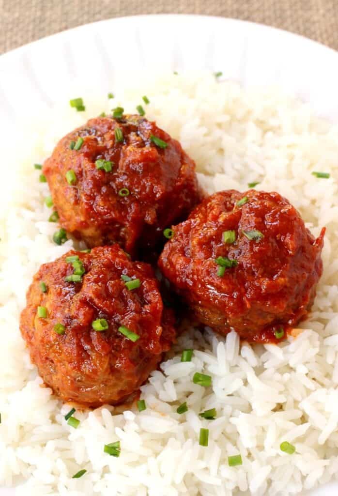 Slow Cooker Cabbage Roll Meatballs on a bed of rice