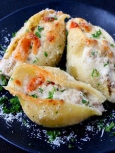 Philly Cheesesteak Stuffed Shells are filled with a cheesy, creamy beef and pepper filling then covered in alfredo sauce!