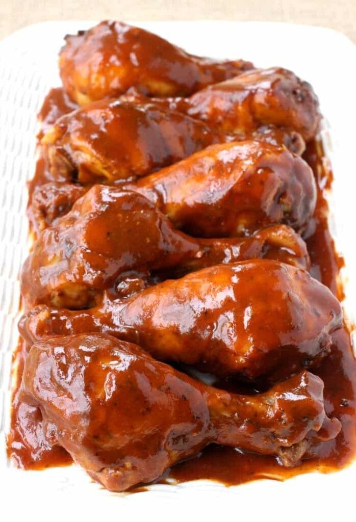 Crock Pot Sticky Chicken Legs is a crock pot chicken recipe that is coated in a sweet and sticky bbq sauce