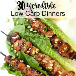 Three pork kabobs wrapped in lettuce