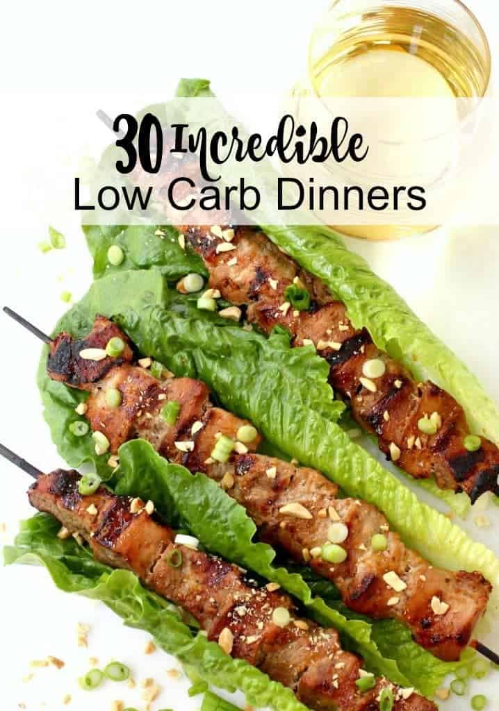 Three pork kabobs wrapped in lettuce 
