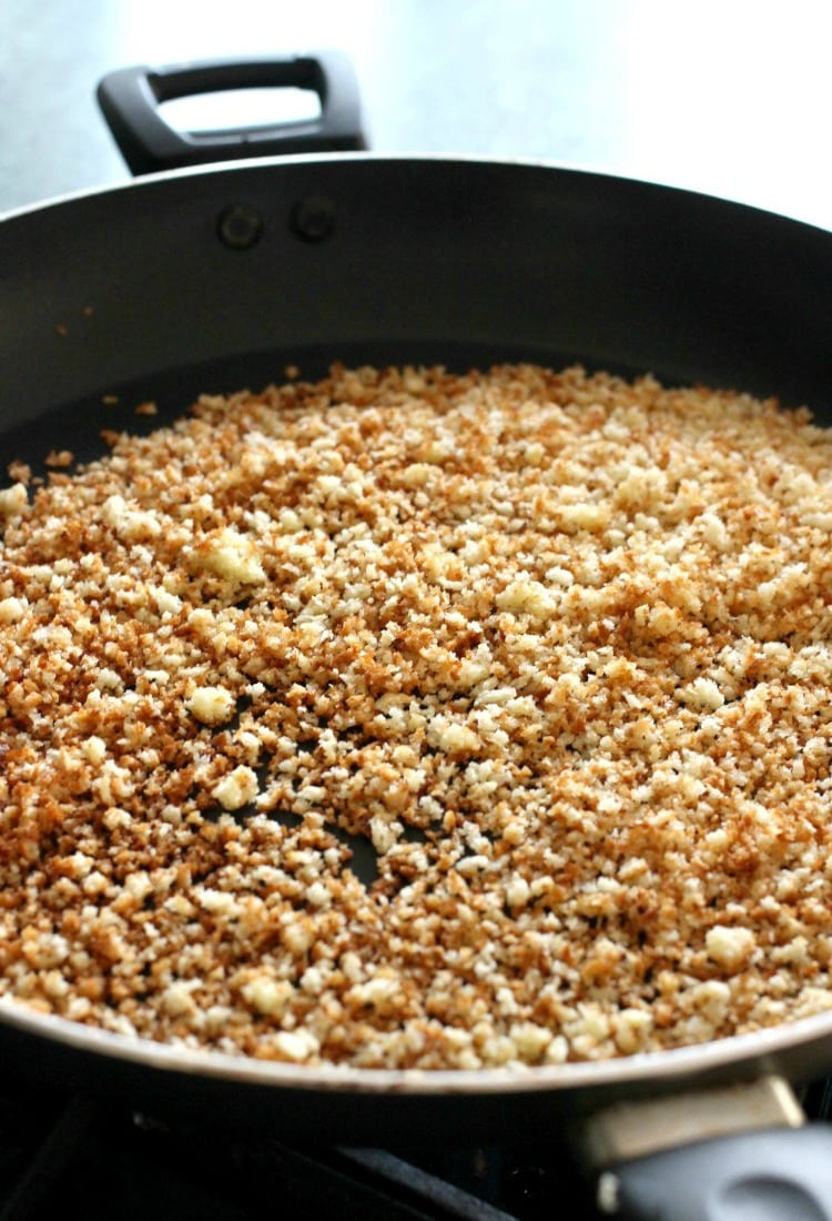 Bread crumbs toasting for a pasta sauce topping