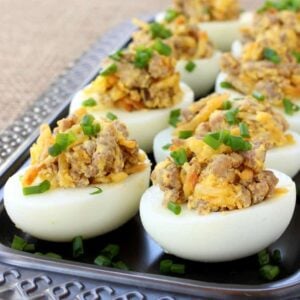 These Sausage and Hash Brown Deviled Eggs are the ultimate guy food - sausage, potatoes and eggs in one bite!