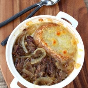 This Slow Cooker Beefy French Onion Soup is the best version of French Onion soup ever!