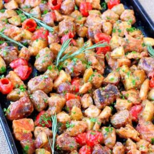 Sheet Pan Chicken Murphy has sausage, chicken, potatoes and peppers tossed in a kicked up brown gravy!