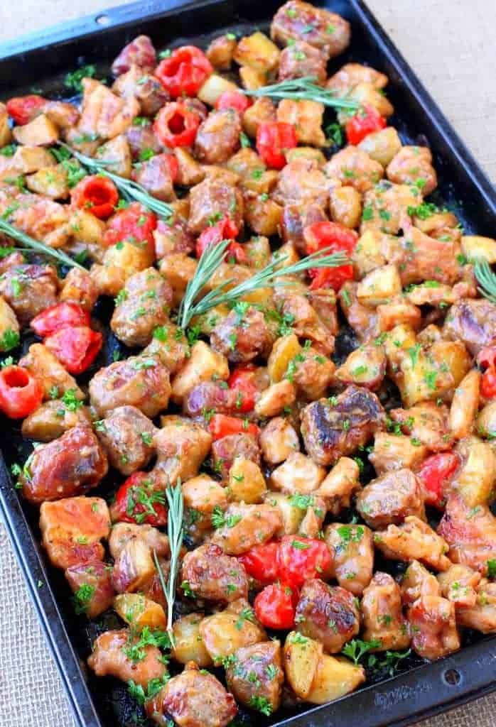 Sheet Pan Chicken Murphy has sausage, chicken, potatoes and peppers tossed in a kicked up brown gravy!