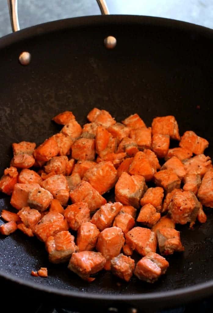 Salmon in wok for Salmon Noodle Bowl