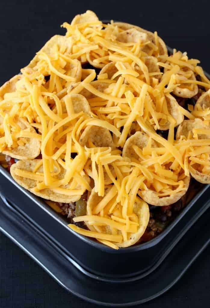 Trashcan Frito Nachos have layers of meat, cheese and fritos piled to the top!